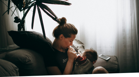 New mother breast feeding a newborn baby